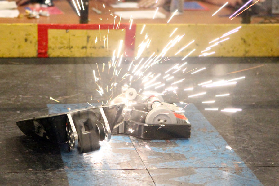 Robots grinding creating sparks